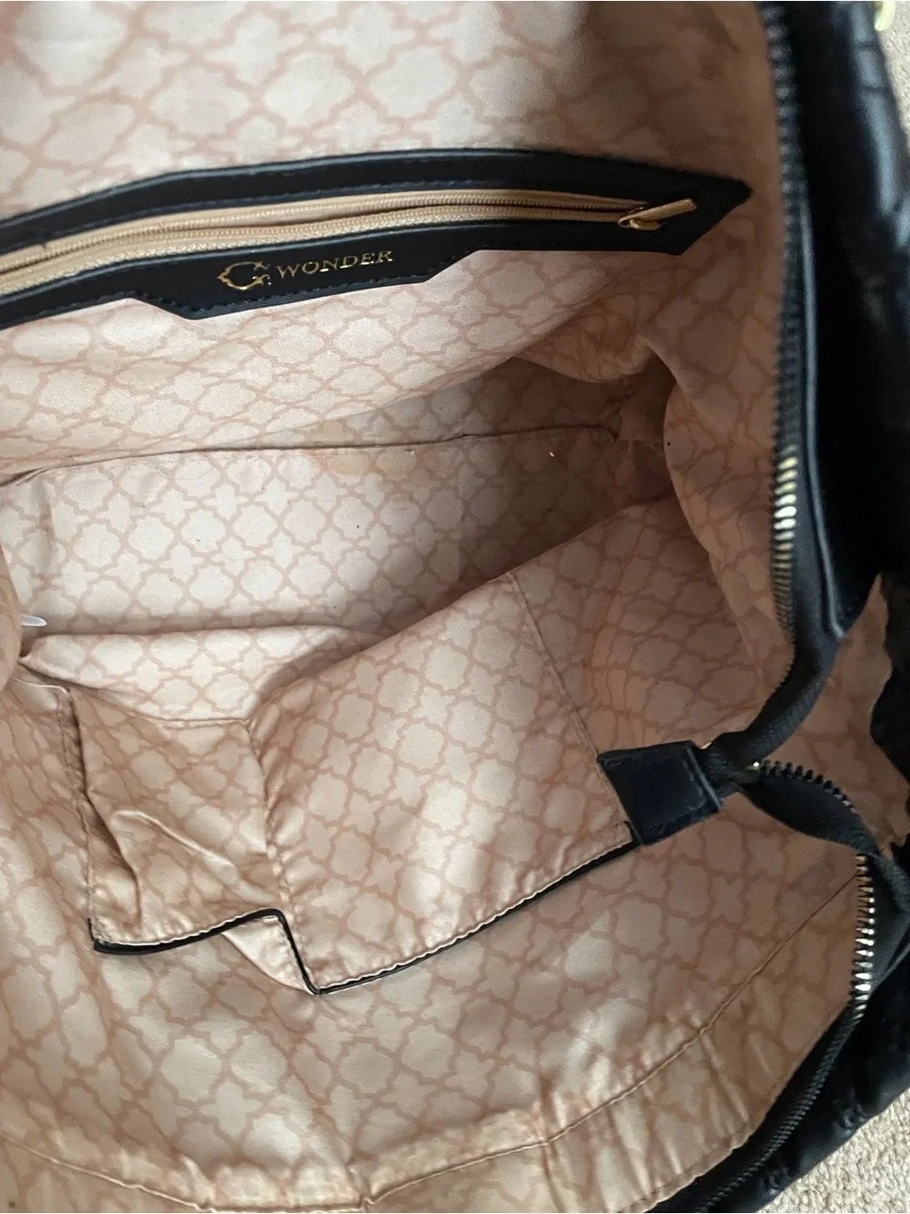 C. Wonder Quilted Black Tote with Gold Chain Handles
